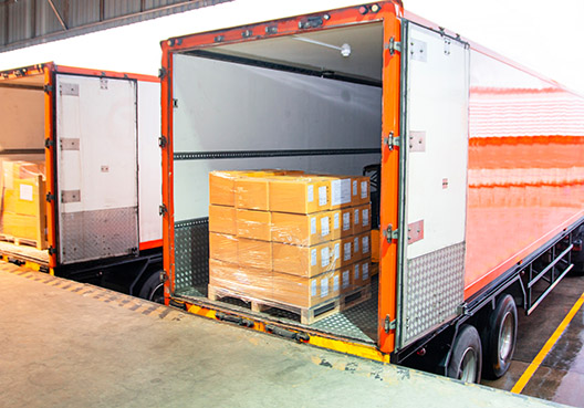 open truck with boxes sealed in plastic