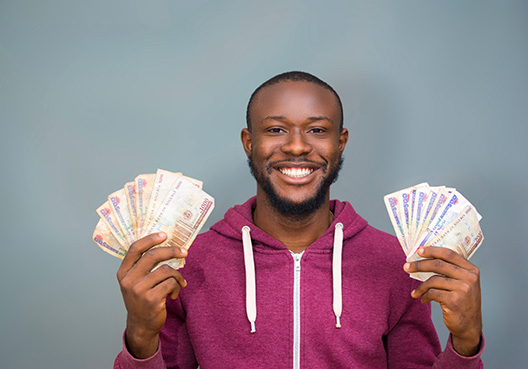 man holding cash