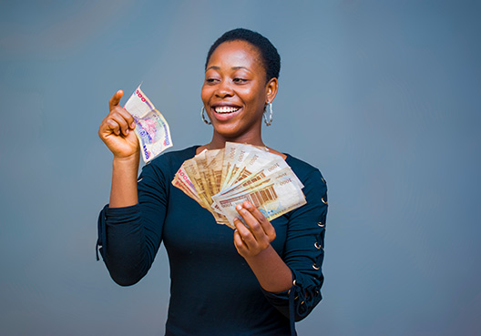 woman holding cash