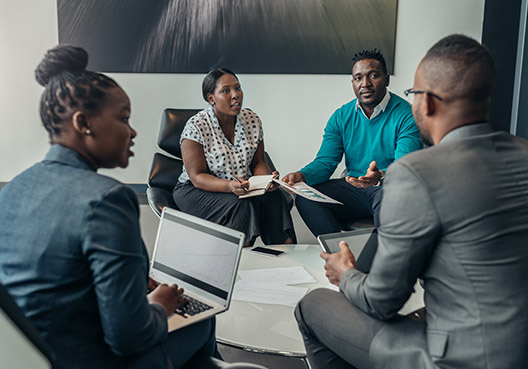 people around a conference room